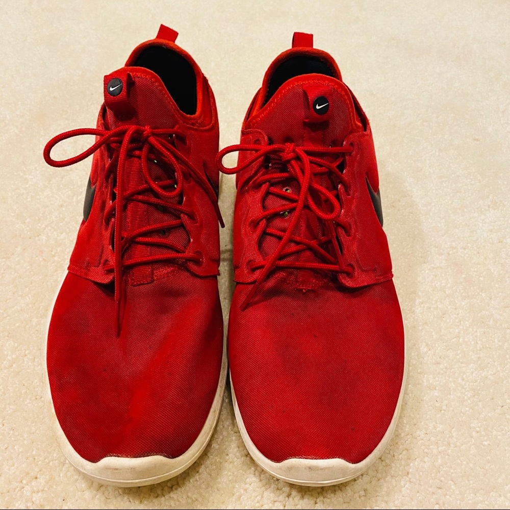 Red Nike downshifted shoes